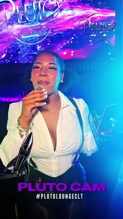 Pluto bottle girl on the mic