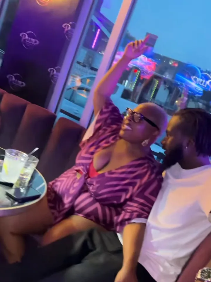 Guests partying by the windows at Pluto Lounge in the afternoon
