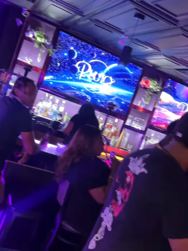 The big Pluto screen over the bar
