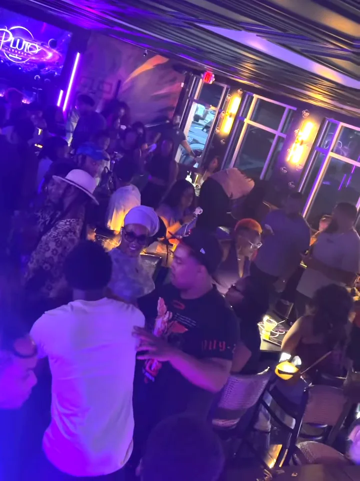 Packed room on a weeknight at Pluto Lounge